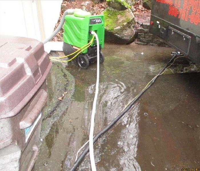 Standing rain water outside a residential home.