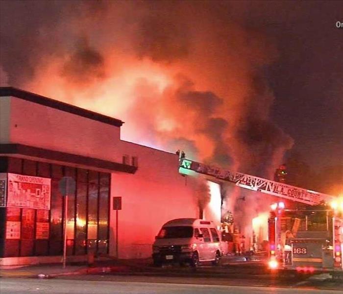 A Commercial business is engulfed in flames
